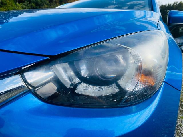 デミオ XDツーリング スマートキ AAC 横滑防止 ETC付き Aストップ LDWS 全席パワーウインドウ AUTOライト PS キーレスエントリー 禁煙 サイドエアバッグ DVD再生 衝突安全ボディ USB ABS(52枚目)