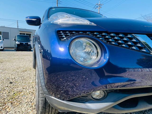 ジューク 15RX Vセレクション AUTOエアコン フルセグテレビ 車線逸脱警報システム 禁煙 ワンオ-ナ-車 横滑り防止機能 Bluetooth DVD再生機能 セキュリティーアラーム 衝突安全ボディ パワーウィンドウ AUX(48枚目)