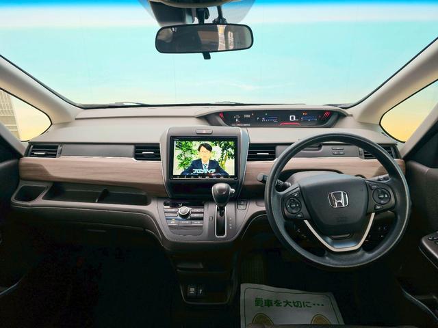フリード Ｇ・ホンダセンシング　純正ナビ・バックモニター・オートクルーズコントロール・Ｂｌｕｅｔｏｏｔｈ接続・ＥＴＣ・ドライブレコーダー・ＴＶ・両側電動スライドドア・プッシュスタート・純正１５インチスチールホイール（4枚目）