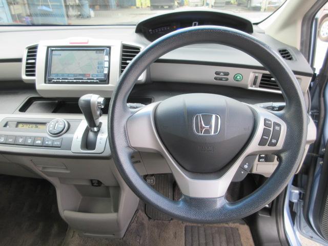 フリードハイブリッド ジャストセレクション　車検２年付き　メモリーナビ　Ｂｌｕｅｔｏｏｔｈ　フルセグＴＶ　バックカメラ　ＥＴＣ　左電動スライドドア　クルーズコントロール　ＨＩＤオートヘッドライト（28枚目）