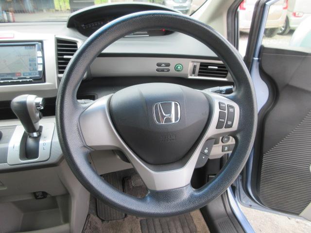 フリードハイブリッド ジャストセレクション　車検２年付き　メモリーナビ　Ｂｌｕｅｔｏｏｔｈ　フルセグＴＶ　バックカメラ　ＥＴＣ　左電動スライドドア　クルーズコントロール　ＨＩＤオートヘッドライト（35枚目）