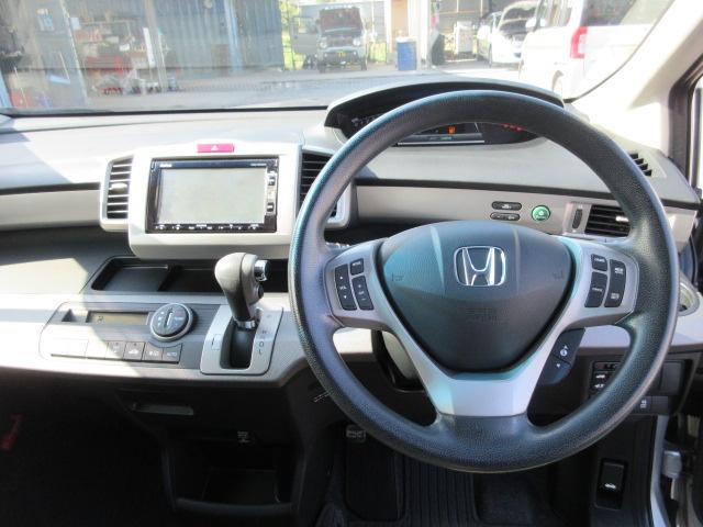 フリードハイブリッド ジャストセレクション 車検2年付き 雹害 6人 メモリーナビ ワンセグTV バックカメラ ETC クルーズコントロール 左電動スライドドア アイドリングストップ HIDオートヘッドライト(27枚目)