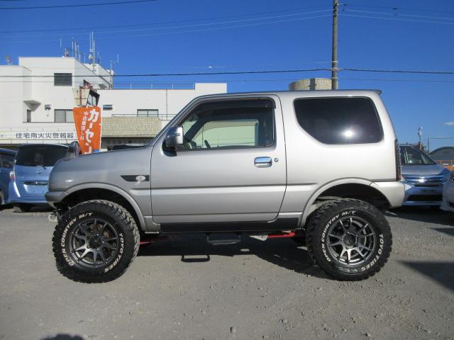 ジムニー ランドベンチャー　最終１０型　５ＭＴ　タニグチマフラー　ＲＡＹＳ１６インチアルミホイールＴＯＹＯオープンカントリーマッドタイヤ２２５／７５　２インチリフトアップ　前後ハーフバンパー　ガラスフィルム貼　ＭＯＭＯステア（10枚目）