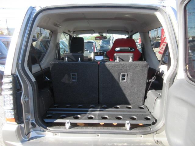 ジムニー ランドベンチャー　最終１０型　５ＭＴ　タニグチマフラー　ＲＡＹＳ１６インチアルミホイールＴＯＹＯオープンカントリーマッドタイヤ２２５／７５　２インチリフトアップ　前後ハーフバンパー　ガラスフィルム貼　ＭＯＭＯステア（38枚目）