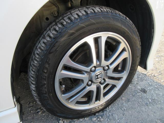 Ｎ－ＢＯＸカスタム Ｇ・Ｌパッケージ　車検２年付き　雹害　メモリナビ　ＢｌｕｅｔｏｏｔｈフルセグＴＶ　バックカメラ　ＥＴＣ　両側電動スライドドア　純正１４インチアルミホイール　ＨＩＤオートヘッドライト　フォグライト（10枚目）