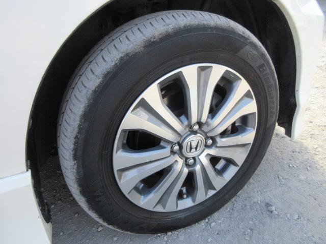 フリードハイブリッド ジャストセレクション　車検２年付き　大画面メモリナビ　フルセグＴＶ　バックカメラ　ＥＴＣ　ハーフレザーシート　両側電動スライドドア　クルーズコントロール　純正１５インチアルミホイール（10枚目）