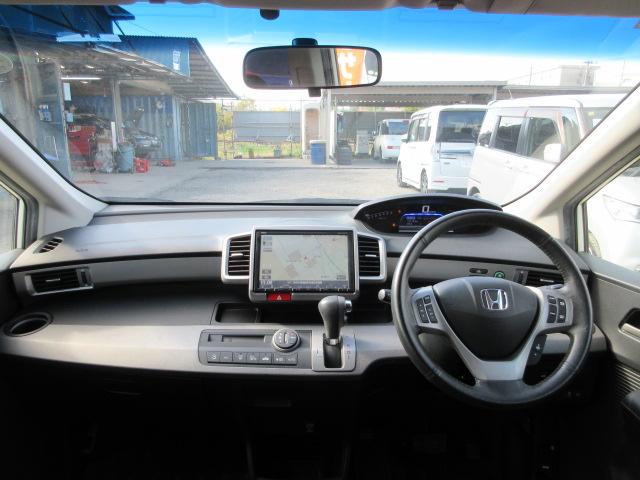 フリードハイブリッド ジャストセレクション　車検２年付き　大画面メモリナビ　フルセグＴＶ　バックカメラ　ＥＴＣ　ハーフレザーシート　両側電動スライドドア　クルーズコントロール　純正１５インチアルミホイール（47枚目）