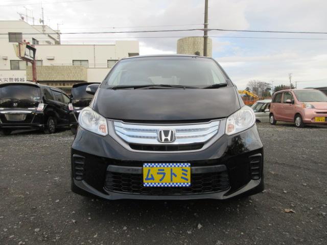 フリードハイブリッド ハイブリッド　車検２年付き　６人　メモリナビ　Ｂｌｕｅｔｏｏｔｈ　ワンセグＴＶ　バックカメラ　ＥＴＣ　左電動スライドドア　社外１５インチアルミホイール　ＨＩＤオートヘッドライト（6枚目）