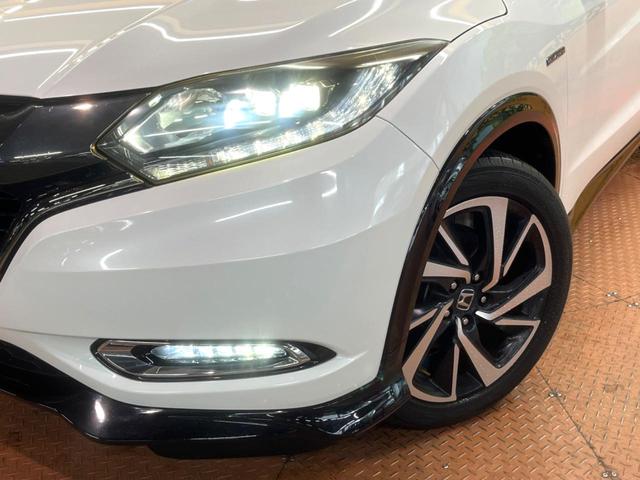 ヴェゼル ハイブリッドＲＳ・ホンダセンシング　禁煙車　ＳＤナビ　フルセグＴＶ　バックカメラ　レーダークルーズ　ホンダセンシング　ハーフレザー　シートヒーター　パドルシフト　純正１８インチアルミ　ドラレコ　ＥＴＣ　オートライト　オートエアコン（13枚目）