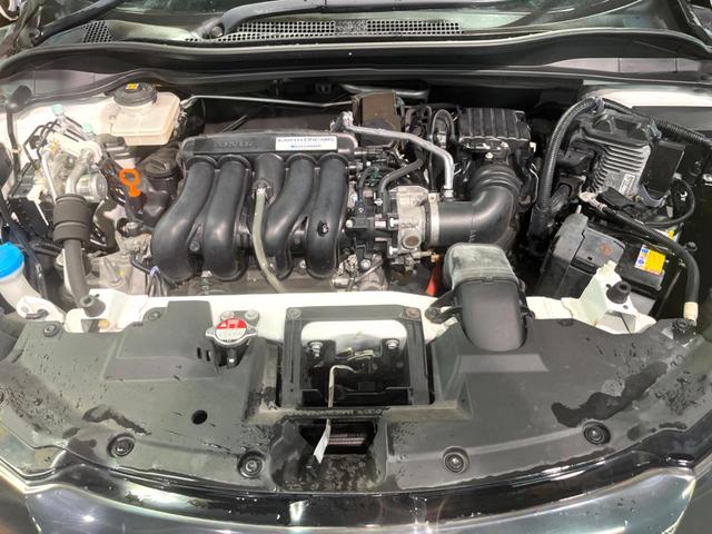 ヴェゼル ハイブリッドＲＳ・ホンダセンシング　禁煙車　ＳＤナビ　フルセグＴＶ　バックカメラ　レーダークルーズ　ホンダセンシング　ハーフレザー　シートヒーター　パドルシフト　純正１８インチアルミ　ドラレコ　ＥＴＣ　オートライト　オートエアコン（19枚目）