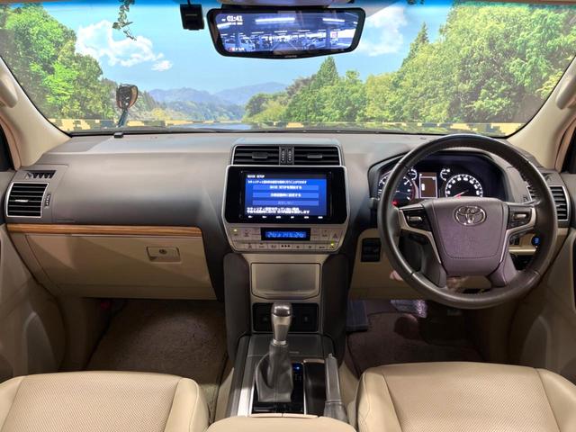 ランドクルーザープラド ＴＸ　Ｌパッケージ　禁煙　純正エアロ　純正９型ナビ　バックカメラ　セーフティセンス　レーダークルーズ　ベージュ革　パワーシート　シートベンチレーション　デジタルミラー　ＬＥＤヘッド　オートハイビーム　純１７アルミ　ＥＴＣ（2枚目）