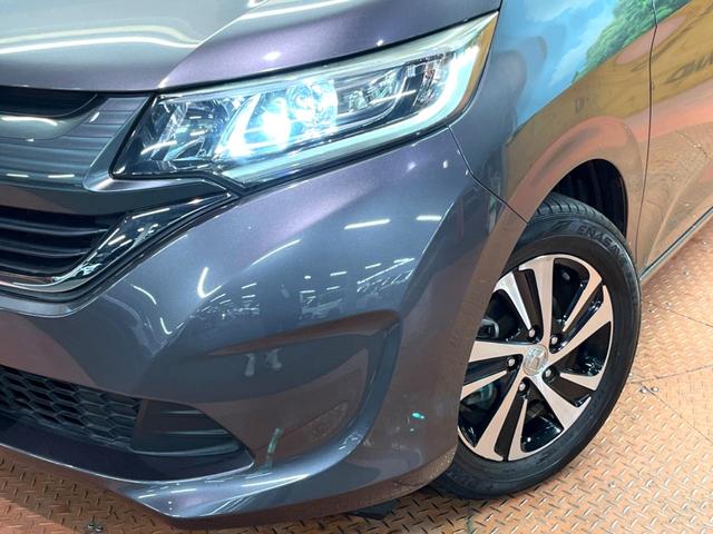 フリード G SDナビ バックカメラ 電動パワースライド ハーフレザー アイドリングストップ 車線逸脱警報 LEDヘッド オートライト ETC オートエアコン 純正15アルミ アイドリングストップ 横滑り防止装置(14枚目)