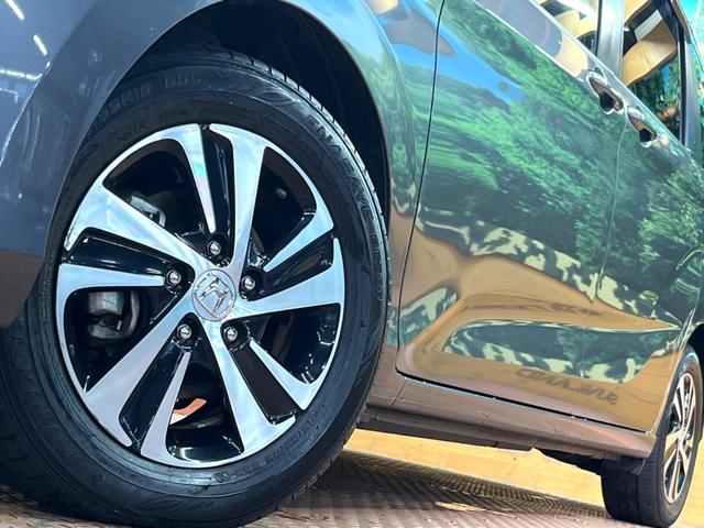 フリード G SDナビ バックカメラ 電動パワースライド ハーフレザー アイドリングストップ 車線逸脱警報 LEDヘッド オートライト ETC オートエアコン 純正15アルミ アイドリングストップ 横滑り防止装置(15枚目)