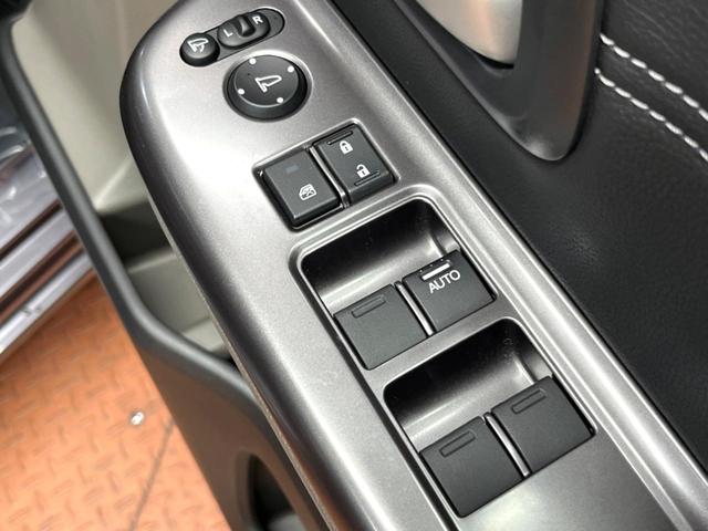 フリード G SDナビ バックカメラ 電動パワースライド ハーフレザー アイドリングストップ 車線逸脱警報 LEDヘッド オートライト ETC オートエアコン 純正15アルミ アイドリングストップ 横滑り防止装置(32枚目)