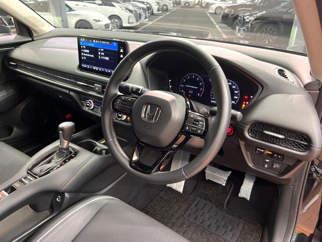 ZR-V X 禁煙 純正9型ナビ 全周囲カメラ ホンダセンシング ブラインドスポットモニター レーダークルーズ 電動リアゲート ハーフレザー LEDヘッド オートライト クリアランスソナー 純正18アルミ ETC(54枚目)