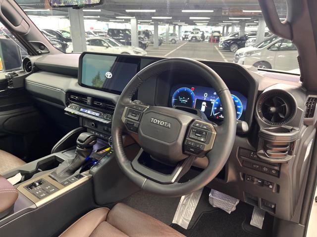 ランドクルーザー250 ZXファーストエディション 禁煙車 サンルーフ 12型ディスプレイオーディオ 全周囲カメラ レーダークルーズ ブラインドスポットモニター デジタルミラー 丸目LEDヘッド&フォグ 茶革 ベンチレーション パワーバックドア ETC(22枚目)