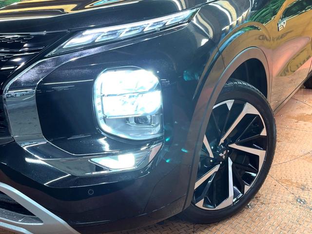 アウトランダーPHEV P 禁煙車 4WD 7人乗り 純正12型ナビ 全周囲カメラ マイパイロット ブラインドスポットモニター 電動リアゲート 黒革 全席シートヒーター メモリーシート LEDヘッド ステアリングヒーター ETC(15枚目)