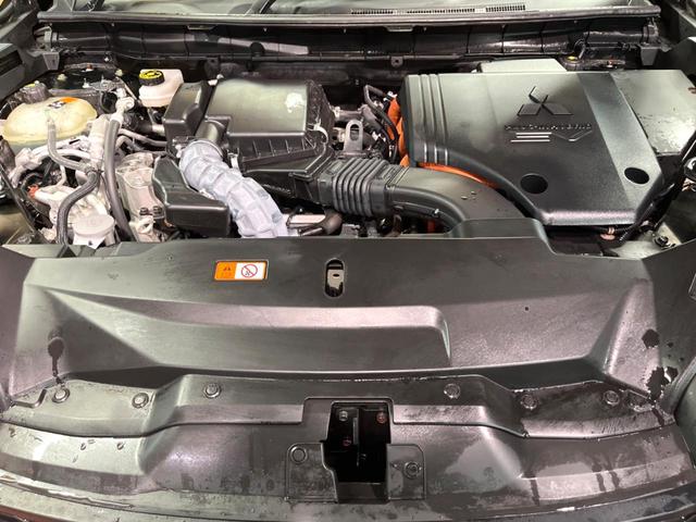 アウトランダーPHEV P 禁煙車 4WD 7人乗り 純正12型ナビ 全周囲カメラ マイパイロット ブラインドスポットモニター 電動リアゲート 黒革 全席シートヒーター メモリーシート LEDヘッド ステアリングヒーター ETC(19枚目)