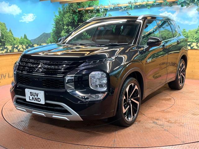 アウトランダーPHEV P 禁煙車 4WD 7人乗り 純正12型ナビ 全周囲カメラ マイパイロット ブラインドスポットモニター 電動リアゲート 黒革 全席シートヒーター メモリーシート LEDヘッド ステアリングヒーター ETC(64枚目)