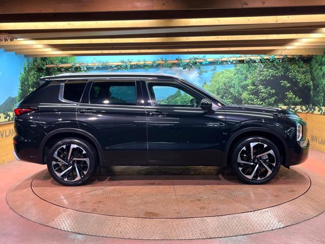 アウトランダーPHEV P 禁煙車 4WD 7人乗り 純正12型ナビ 全周囲カメラ マイパイロット ブラインドスポットモニター 電動リアゲート 黒革 全席シートヒーター メモリーシート LEDヘッド ステアリングヒーター ETC(66枚目)
