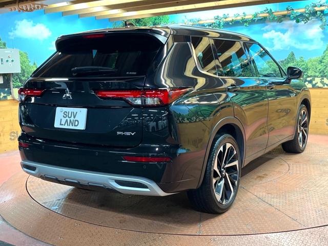 アウトランダーPHEV P 禁煙車 4WD 7人乗り 純正12型ナビ 全周囲カメラ マイパイロット ブラインドスポットモニター 電動リアゲート 黒革 全席シートヒーター メモリーシート LEDヘッド ステアリングヒーター ETC(67枚目)
