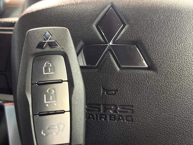 アウトランダーPHEV P 4WD 禁煙 BOSEサウンド 純正9型ナビ 全周囲カメラ ブラインドスポットモニター マイパイロット 電動リアゲート 黒革 メモリーシート シートヒーター LEDヘッド 純正20アルミ ETC(47枚目)