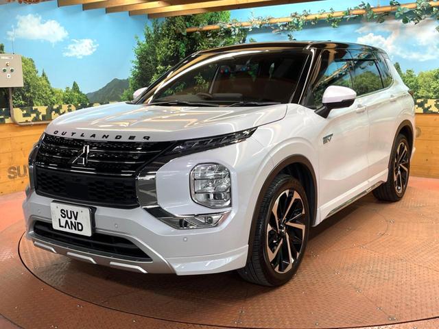 アウトランダーPHEV P 4WD 禁煙 BOSEサウンド 純正9型ナビ 全周囲カメラ ブラインドスポットモニター マイパイロット 電動リアゲート 黒革 メモリーシート シートヒーター LEDヘッド 純正20アルミ ETC(64枚目)
