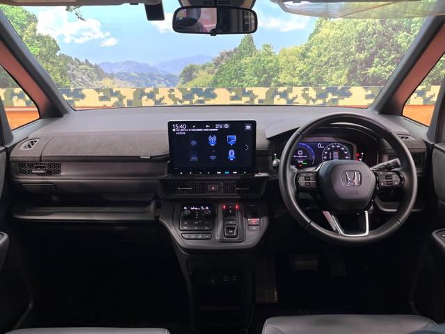 ステップワゴン e:HEVスパーダ プレミアムライン 禁煙 純正11型ナビ 全周囲カメラ フリップダウン ブラインドスポットモニター レーダークルーズ 両側電動ドア 電動リアゲート ハーフレザーシート シートヒーター LEDヘッド 純正17アルミ ETC(2枚目)