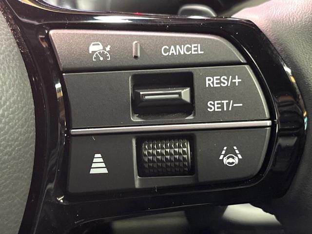 ステップワゴン e:HEVスパーダ プレミアムライン 禁煙 純正11型ナビ 全周囲カメラ フリップダウン ブラインドスポットモニター レーダークルーズ 両側電動ドア 電動リアゲート ハーフレザーシート シートヒーター LEDヘッド 純正17アルミ ETC(7枚目)