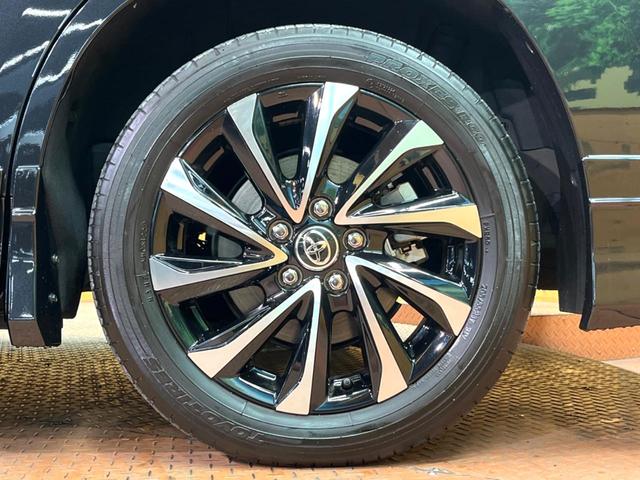 ヴォクシー ハイブリッドS-Z 禁煙 GRエアロ フリップダウン 純正10型ナビ バックカメラ レーダークルーズ 両側電動ドア 三眼LEDヘッド オートハイビーム ハーフレザーシート シートヒーター 純正17アルミ ETC(29枚目)