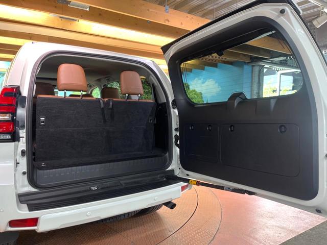 ランドクルーザープラド TX Lパッケージ 70thアニバーサリーリミテッド 禁煙 7人 純正9型ナビ バックカメラ レーダークルーズ 茶革 パワーシート シートベンチレーション LEDヘッド オートハイビーム クリアランスソナー ETC 純正18インチアルミ ルーフレール(61枚目)