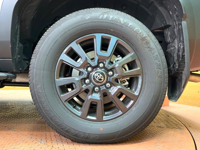 ランドクルーザー250 VX 禁煙車 7人乗り サンルーフ 純正12型ナビ 全周囲カメラ JBLサウンド デジタルインナーミラー ブラインドスポットモニター レーダークルーズ 電動リアゲート 黒側 シートベンチレーション ETC(29枚目)