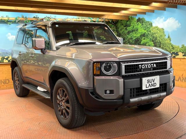 ランドクルーザー250 VX 禁煙車 7人乗り サンルーフ 純正12型ナビ 全周囲カメラ JBLサウンド デジタルインナーミラー ブラインドスポットモニター レーダークルーズ 電動リアゲート 黒側 シートベンチレーション ETC(62枚目)