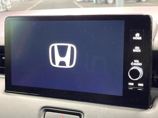 ヴェゼル e:HEV Z 禁煙車 純正SDナビ バックカメラ 衝突軽減装置 レーダークルーズ 電動リアゲート ハーフレザー シートヒーター LEDヘッド ブラインドスポットモニター 純正18インチアルミ(3枚目)