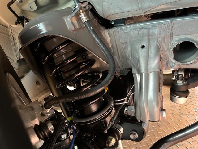 ジムニー ＸＣ　届出済未使用車　クルコン　シートヒーター　ダウンヒルアシスト　ＬＥＤヘッド＆フォグ　純正１６インチアルミ　横滑り防止装置　アイドリングストップ　スマートキー　オートライト　オートエアコン（21枚目）