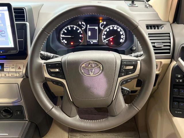 ランドクルーザープラド ＴＸ　Ｌパッケージ　マットブラックエディション　禁煙　７人　サンルーフ　ＢＩＧ－Ｘ１１型ナビ　バックカメラ　レーダークルーズ　ベージュ革　シートベンチレーション　ＬＥＤヘッド　オートハイビーム　純正１８インチアルミ　ルーフレール　ＥＴＣ（68枚目）