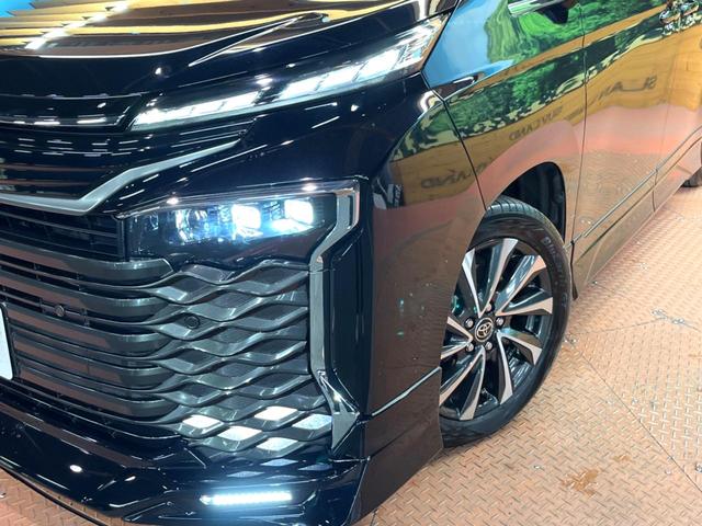 ヴォクシー ハイブリッドS-Z 禁煙 GRエアロ 快適利便パック フリップダウン 純正10型ナビ バックカメラ ブラインドスポットモニター レーダークルーズ 電動リアゲート 三眼LEDヘッド オートハイビーム 両側電動ドア ETC(15枚目)