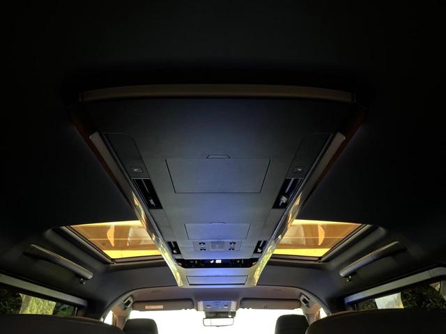 ヴェルファイアハイブリッド Z プレミア 禁煙 ガラスルーフ フリップダウン 14型ディスプレイ 全周囲カメラ レーダークルーズ ブラインドスポットモニター デジタルミラー 三眼LEDヘッド&フォグ 合皮シート メモリーシート ETC(65枚目)