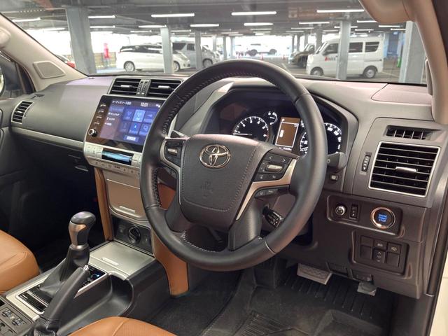 ランドクルーザープラド TX Lパッケージ 70thアニバーサリーリミテッド 禁煙 7人 サンルーフ 純正9型ナビ 全周囲カメラ レーダークルーズ LEDヘッド オートハイビーム 茶革 パワーシート シートベンチレーション 純正18インチアルミ ETC クリアランスソナー(21枚目)