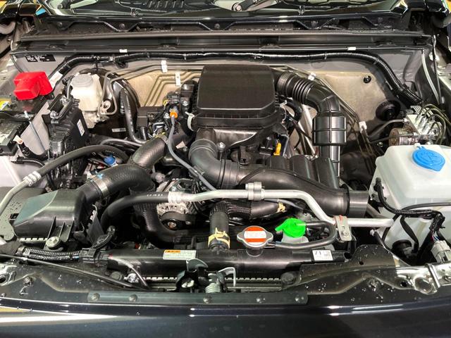 ジムニー ＸＣ　届出済未使用車　セーフティサポート　クルコン　コーナーセンサー　シートヒーター　アイドリングストップ　ダウンヒルアシスト　横滑り防止装置　ＬＥＤヘッド　オートライト　純正１６インチアルミ（19枚目）