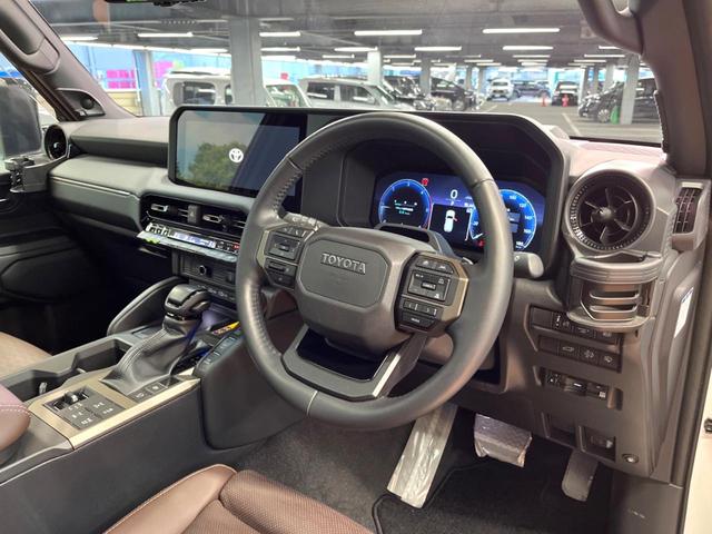ランドクルーザー２５０ ＺＸ　禁煙車　サンルーフ　モデリスタパッケージ　シグネチャーイルミ　モデリスタオーバーフェンダー　ＪＢＬ　１２型ディスプレイ　全周囲カメラ　レーダークルーズ　デジタルミラー　ブラインドスポットモニター（22枚目）