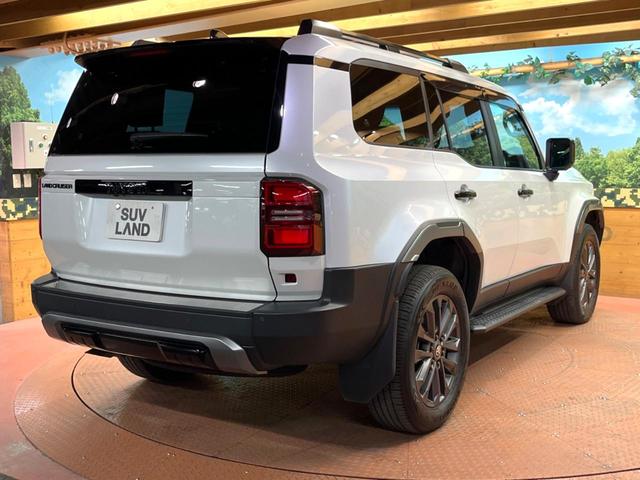 ランドクルーザー２５０ ＺＸ　禁煙車　サンルーフ　モデリスタパッケージ　シグネチャーイルミ　モデリスタオーバーフェンダー　ＪＢＬ　１２型ディスプレイ　全周囲カメラ　レーダークルーズ　デジタルミラー　ブラインドスポットモニター（63枚目）