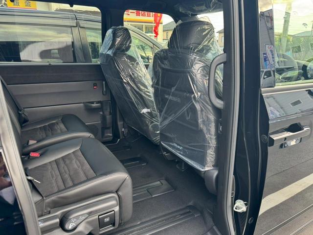 ステップワゴン eHEVスパーダプレミアムラインブラックエディション 【登録済未使用車◆走行5km】【11.4型Bluetoothオーディオ対応SDナビ◆15.6型フリップダウン◆全方位カメラ】両側自動ドア◆電動リヤゲート【BSM◆ACC◆ATハイビーム】専用アルミ(19枚目)