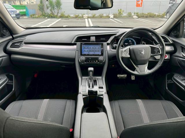 シビック セダン ホンダセンシング衝突軽減 走行36,983km 禁煙車 2025年製グッドイヤー夏タイヤ ギャザーズ製Bluetoothオーディオ対応SDナビ/Bカメラ/ETC 電子ホールドパーキングブレーキ Pシフト スマート&スペアキー 保証書&取扱説明書(15枚目)