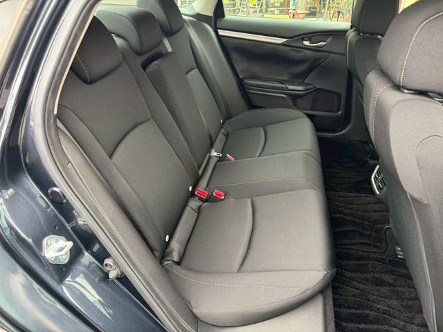 シビック セダン ホンダセンシング衝突軽減 走行36,983km 禁煙車 2025年製グッドイヤー夏タイヤ ギャザーズ製Bluetoothオーディオ対応SDナビ/Bカメラ/ETC 電子ホールドパーキングブレーキ Pシフト スマート&スペアキー 保証書&取扱説明書(18枚目)