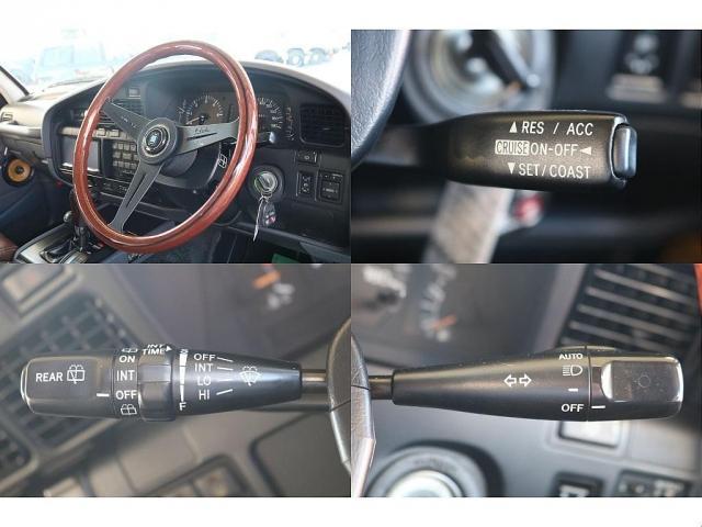 ランドクルーザー８０ ＶＸリミテッド　買取直販車両　アルルブルー　リフトアップ　角目四灯　ナローボディタイミングチェーン　ナルディウッドステアリング　デイトナスチールホイール　ＫＥＬＬＹ　ＳＡＦＡＲＩタイヤ（24枚目）