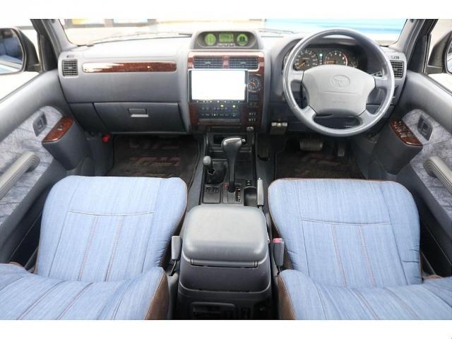ランドクルーザープラド TZ Renocaアメリカンクラシック アンヴィルグレー 新品丸目フェイス 新品DEANカルフォルニア 新品TOYOオープンカントリ― 新品ディスプレオオーディオ 新品シートカバー ウッド調インパネ(9枚目)