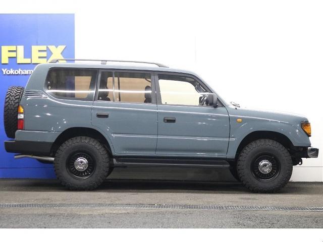 ランドクルーザープラド TZ Renocaアメリカンクラシック アンヴィルグレー 新品丸目フェイス 新品DEANカルフォルニア 新品TOYOオープンカントリ― 新品ディスプレオオーディオ 新品シートカバー ウッド調インパネ(10枚目)