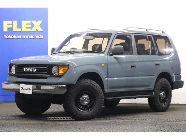 ランドクルーザープラド TZ Renocaアメリカンクラシック アンヴィルグレー 新品丸目フェイス 新品DEANカルフォルニア 新品TOYOオープンカントリ― 新品ディスプレオオーディオ 新品シートカバー ウッド調インパネ(27枚目)