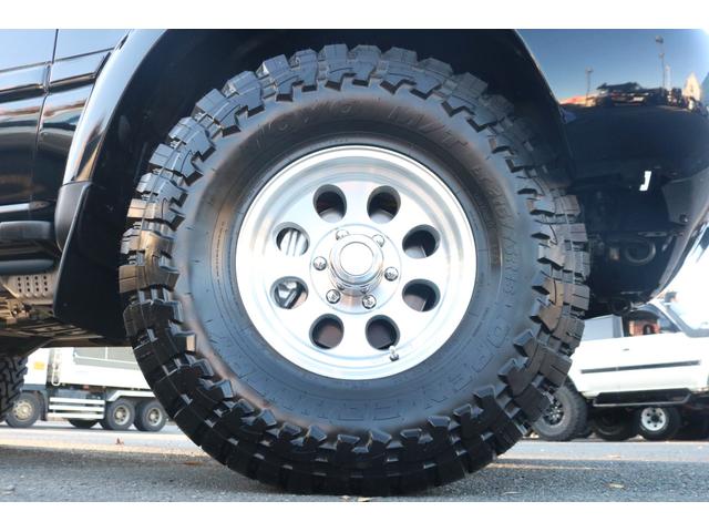 ランドクルーザー８０ ＶＸ　後期最終型　茶内装　下回り防錆施工　輸出仕様角目四灯　リフトアップ　新品ジムラインＡＷ　新品オープンカントリーＭＴタイヤ　三色テールレンズ　　新品クラシックシートカバー　ナルディウッドステアリング（36枚目）